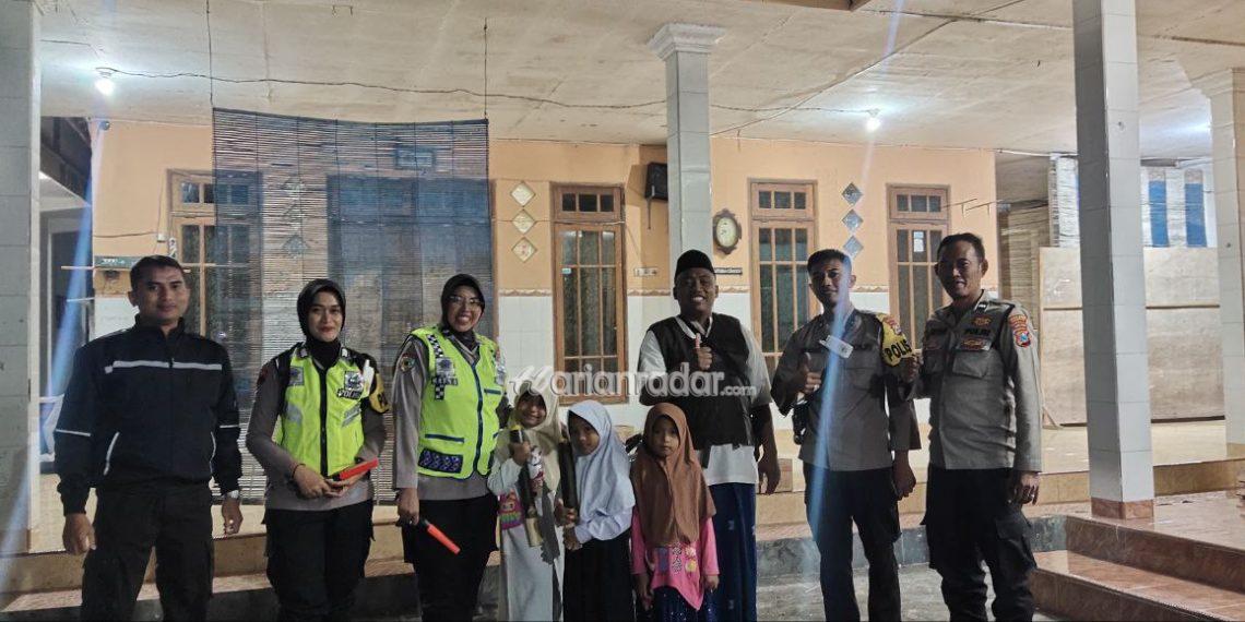 Foto : Polisi RW Bangkalan Amankan Pawai Obor Peringati Malam 1 Muharrom