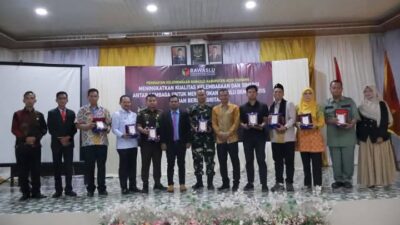 Mewakili Bupati Aceh Tamiang, Asisten Pemerintahan, Keistimewaan Aceh Tamiang dan Kesejahteraan Rakyat Setdakab, Muslizar, S.Pd, MM