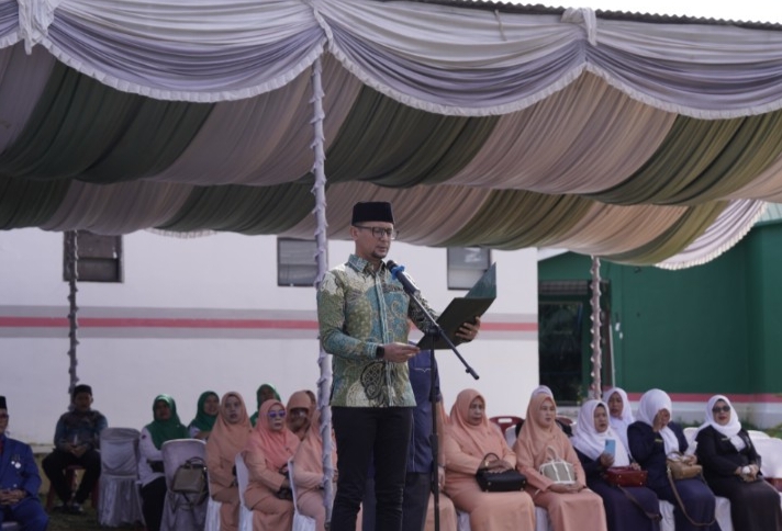 Bupati Labusel Fery Sahputra Simatupang membacakan pidato Menteri Agama RI Nasaruddin Umar